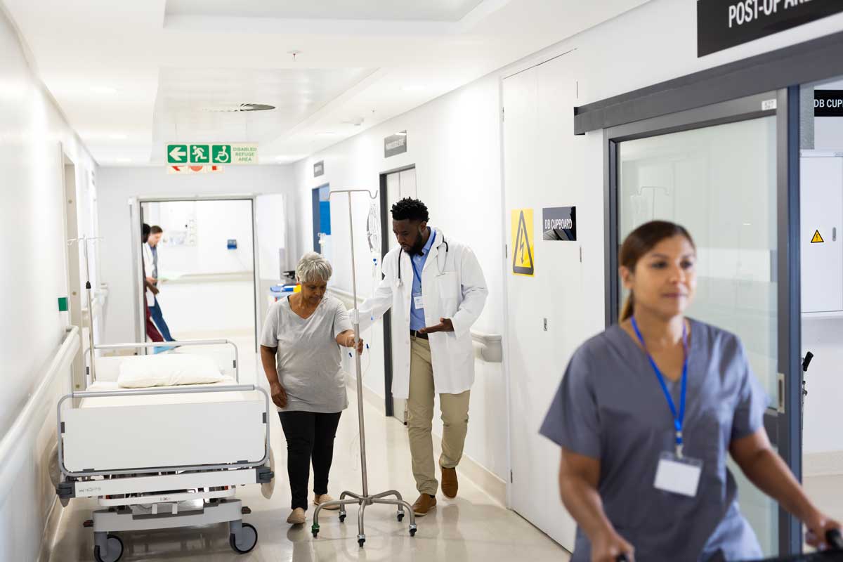 african-american-male-doctor-talking-to-diverse-se-2023-11-27-05-25-31-utc Fire Risk Assessment Healthcare